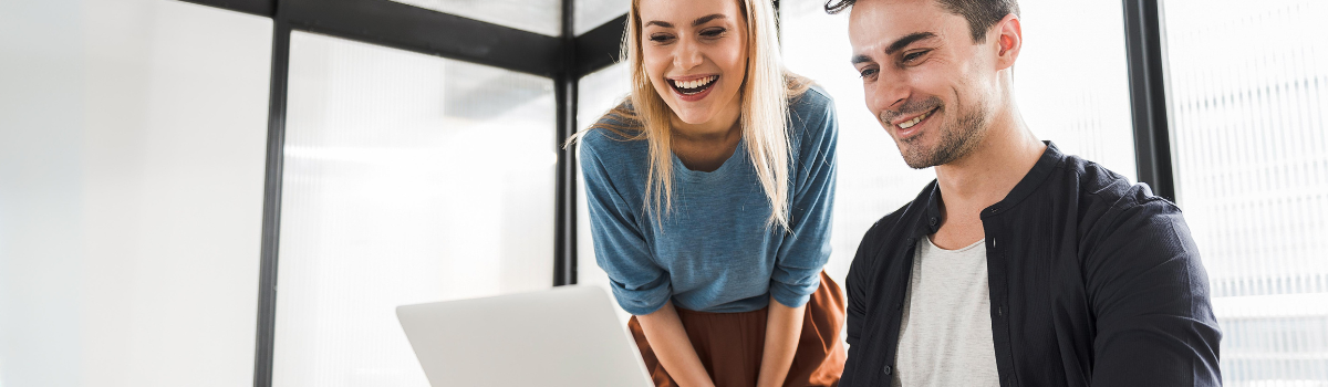 recruiter smiling over computer